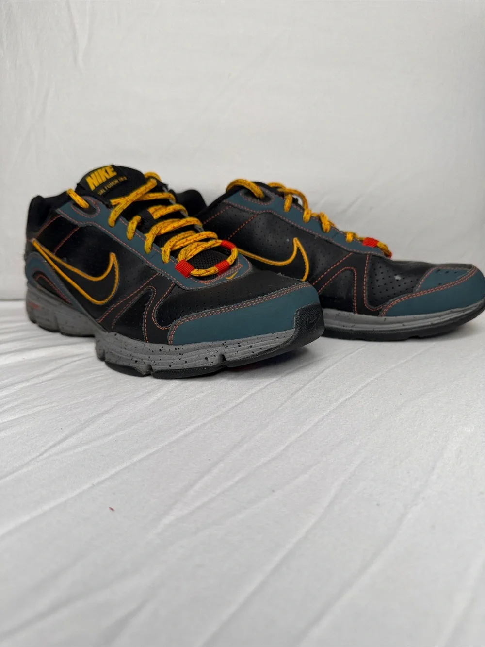 Nike Black and Yellow Women's Dual Fusion TR2 Athletic Shoes with Teal Accents
